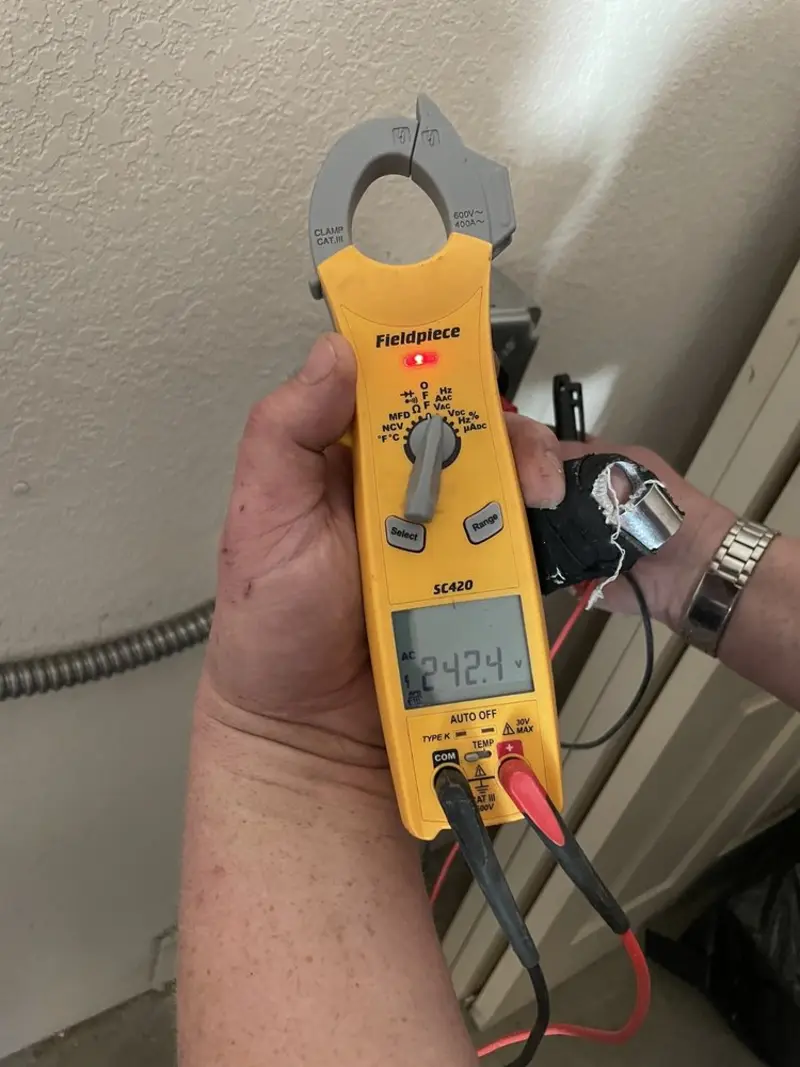 Voltage testing with clamp meter during Hot Tub / Pool Electrical Wiring in Radcliff